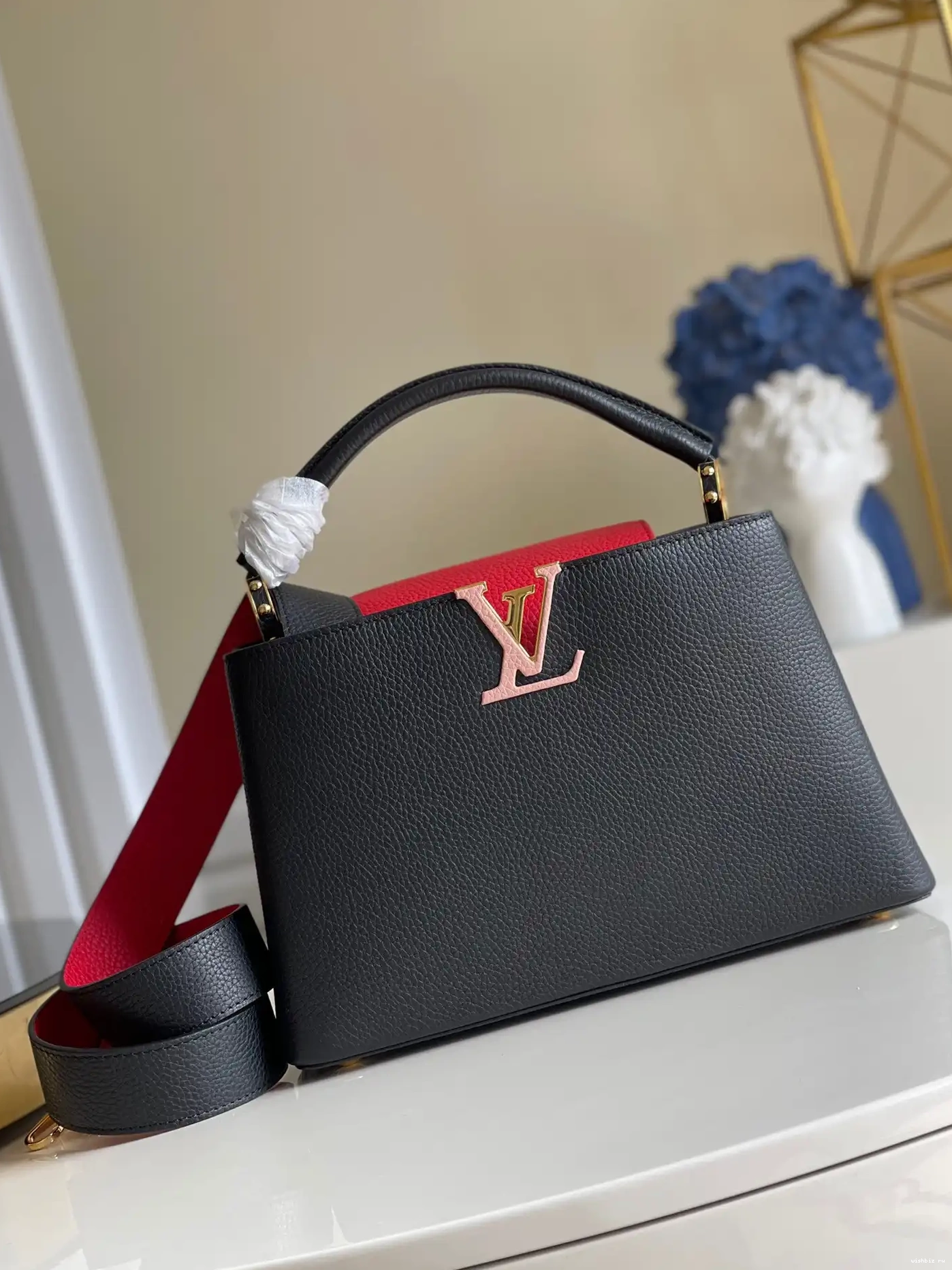 WIS CAPUCINES LOUIS VUITTON PM 0521